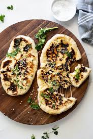 Cheese Stuffed Garlic Naan Simply Delicious Recipe In 2020 Savoury Baking Garlic Naan Recipe Garlic Naan