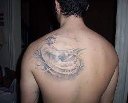 The tattoo begins at the top of the shoulder and is mainly of trees. Rowing Tattoo Tattoos And Tattoo Designs Tattoos Rowing Places For Tattoos