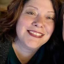 What are some woodsy campgrounds with a pool, sewer, water, and electric  hookups near Waynesville, NC?