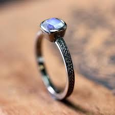 Since the 20th century, it has been a necessary process to purchase engagement ring when a man gets ready to propose. Rainbow Moonstone Engagement Ring White Gold Wheat Ring