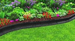 The spikes easily pierce through the fabric and help secure the barrier. Create A Gorgeous Garden With 4 Rubber Premium Landscape Edging Flexible Yet Modern Design Mode Landscape Edging Landscaping With Rocks Gorgeous Gardens
