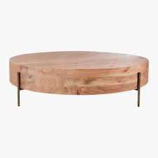 The legs intersect on the floor in the center of the table. The Super Low Coffee Table Is In Again Architectural Digest