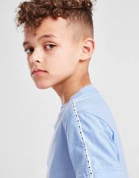 This product is made with at least 75% organic cotton fibers. Nike Swoosh Tape T Shirt Shorts Set Children