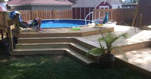 The Three Tier Deck I Built Around My Above Ground Pool Decks Swimming Pools Backyard Decks Around Pools Pool Area Landscaping