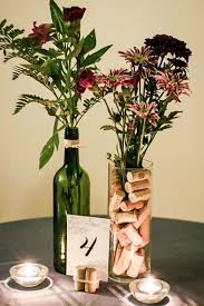 The rich colors and tastes of a wine themed wedding will make your guests long remember your if you are a wine lover, then you can easily incorporate your passion for vino into your wedding theme. Bottle Wedding Ideas Wine Bottle Wedding Centerpieces Wine Theme Wedding Wedding Wine Bottles