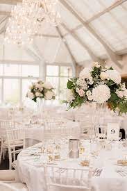50 Most Popular White Wedding Decoration Ideas For Your Elegant Wedding White Wedding Decorations Wedding Flower Decorations Flower Centerpieces Wedding