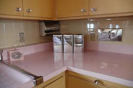 untouched 1950s house with a soft pink
