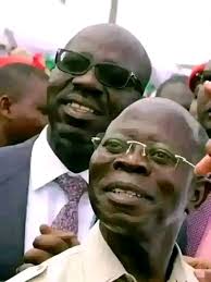 Omotola enjoying Omashola's dance moves