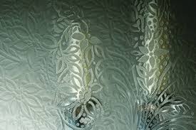 Creating art on the surface of the glass is a traditional technique. Obscure Glass Everest