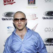 Pitbull rarely ventures out without a huge pair of sunglasses perched on his elegant nose. Relive Pitbull S Best Sunglass Fashion Moments Photo 1