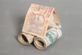 Inr) is the official currency of india. Huis Gemaakt Rollen Van Indiase Roepie Bankbiljetten Geisoleerd Op Grijs 1182250 Stockfoto