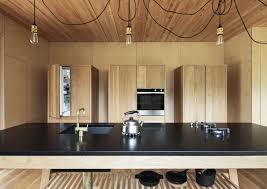 Freestanding cabinets stand out from the plain look of traditional box designs, bringing individual character and a unique style to your kitchen in a way that only furniture can. Stevens Lawson Architects Designs Karekare Bach Cabin Wallpaper
