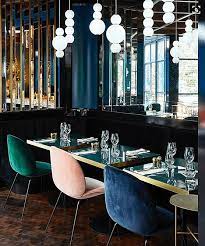 Velvet Chairs In Pink Green And Blue And Art Deco Style Lighting And Mirrors Restaurant Interior Design Hotel Interior Design Restaurant Interior