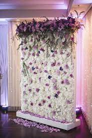Floriculture S White Lavender Flower Wall With Large Cascading Arrangements A Lavender Wedding Decorations White Flower Arrangements Pink Flower Arrangements