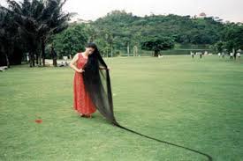 At 5 ft 4 inches, kamble has to climb a stool to help her. Meet Xie Qiuping The Woman With The Longest Hair In The World