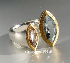 Perfection, as depicted by this impressive 1.24 carat round diamond, is summarized in one word recently purchased rings ›. Sternchen 1062 Unique Ring 925 Silver 24 Ct Gold Aquamarine Morganite