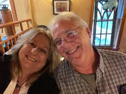 Should I book whale watching excursions in Juneau now or during the cruise?