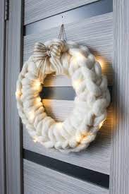 Still, if you don't know how to knit then you might. Chunky Knit Christmas Wreath Xmas Wall Decor Wreath Rustic Etsy Christmas Wreaths Christmas Knitting Diy Wall Hanging Yarn