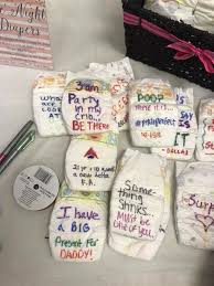 Just arrange a stack of note cards decorative tape markers and clean diapers on a table like this then invite the party guests to write some funny diaper messages or their best wishes on the cards for the parents. Funny Baby Shower Diaper Quotes