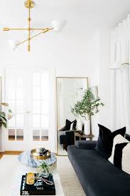 This Simple Styling Trick Made My Nyc Apartment Feel 10 Times Bigger French Doors Interior Living Room Decor Home Decor