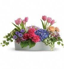 We are a local full service florist. Pin By Ara Antolin On Holiday Easter Flower Centerpieces Fresh Flowers Arrangements Easter Flowers
