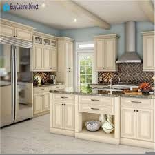 cream kitchen cabinets, cream colored