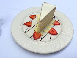 In Charleston S C Peninsula Grill Chef Robert Carter S Specialty Is The Coconut Cake A 12 Layer 12 Pound Behemoth Of Food Food Network Recipes Food Dishes
