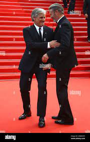 Viggo Mortensen, left, and Mads Mikkelsen pose for photographers upon  arrival at the 75th anniversary celebration of the Cannes film festival and  the premiere of the film 'The Innocent' at the 75th