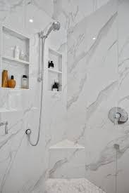 Single wall mount fixed rain shower head in chrome. Shower Design Trends Mountainwood Homes