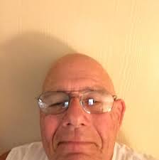 Is Formica worth adding to a sacrificial hardboard top?