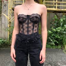 Black corset tops and red corsets are two of the most popular styles for valentines day. Vintage Victoria S Secret Black Sheer Floral Bustier Depop