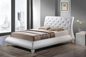 The perfect king bed for your master suite exists! Baxton Studio Metropolitan Wood And Leather Contemporary King Size Bed Monalisa Sanders