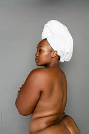 Profile Of Nude Black Woman From Behind Wearing Towel