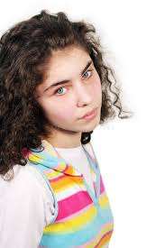 Retrato Del Primer De Ella Ella Muchacha Pre-adolescente De Pelo Ondulado  Confiada Alegre Dulce Agradable Preciosa Atractiva Atra Imagen de archivo