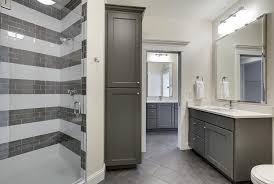 Charcoal Gray Bathroom With White And Gray Striped Shower Tiles Contemporary Bathroom Gray Bathroom Walls Gray And White Bathroom Grey Modern Bathrooms