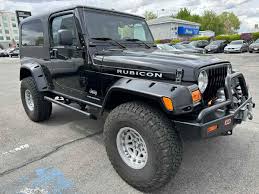 Image result for Brilliant Black 2005 Jeep