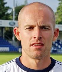Ten-man Guiseley sunk by late goals