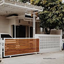 Rumah anda umumnya pagar rumah dari kayu bukanlah pagar yang terbuat dari kayu secara keseluruhan namun merupakan kombinasi kayu dan jual pintu dorong kombinasi grc serat kayu pintu besi minimalis pagar grc dengan harga rp657000 dari toko online jayakaryasteell kota depok. 6 Kumpulan Model Pagar Minimalis Yang Elegan Dan Cocok Untuk Rumah Type 36 Helloshabby Com Interior And Exterior Solutions