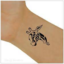 Black tribal giraffe head tattoo on left leg. Temporare Tattoo Giraffe Wasserdicht Ultra Dunne Realistische Etsy