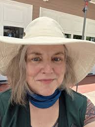 What are the best ways to find and collaborate with photographers and  artists for nature programs at the MN Zoo?