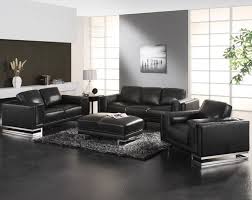 A traditional leather sofa is dark by nature so the easiest way to balance that out is to accent and/or surround it with plenty of light for desirable contrast. Modern Living Room Black Furniture Novocom Top