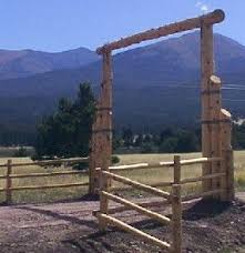 Like all fences, they need gates for access and enclosure. Pole Fence Ideas Ideas For Ranch Entryways Ranch Entrances Rustic Driveway Entrances Farm Entrance Farm Gate Ranch Gates