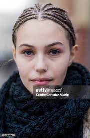 Lou Beyer wearing a grey hoody with her father German singer Nino de...  News Photo