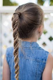 Messy ponytail with a cute bow. Twist Wrap Ponytail Cute Girls Hairstyles