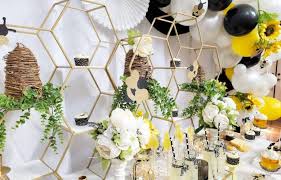 A cute fall bridal shower centerpiece of apples and a bright blooms arragement. Bride To Bee Bridal Shower Theme Ideas Bridal Shower 101