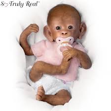 Eyes closed, like a sleeping baby hair: Coco So Truly Real Poseable Lifelike Baby Monkey Doll