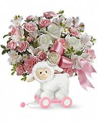 Dozen white roses from $75.00. Sweet Little Lamb Pink Celebrate A New Arrival With This Arrangement Of White Roses Light Pink Spray Roses White New Baby Flowers Flower Gift Baby Bouquet