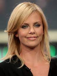 Charlize Theron Long Layered Hairstyle Charlize Theron Hair Styles And Colors Through The Years Charlize Theron Hair Hairstyle Hair Styles