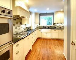 Bright, white cabinets bounce light and make for a modern kitchen. Off White Cabinets With Oak Floor Kitchen Design Kitchen Cabinet Door Styles Contemporary Kitchen Cabinets