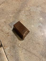 The sayings on the kit kat bars in a scene in office : 9kpqbau1pxej4m